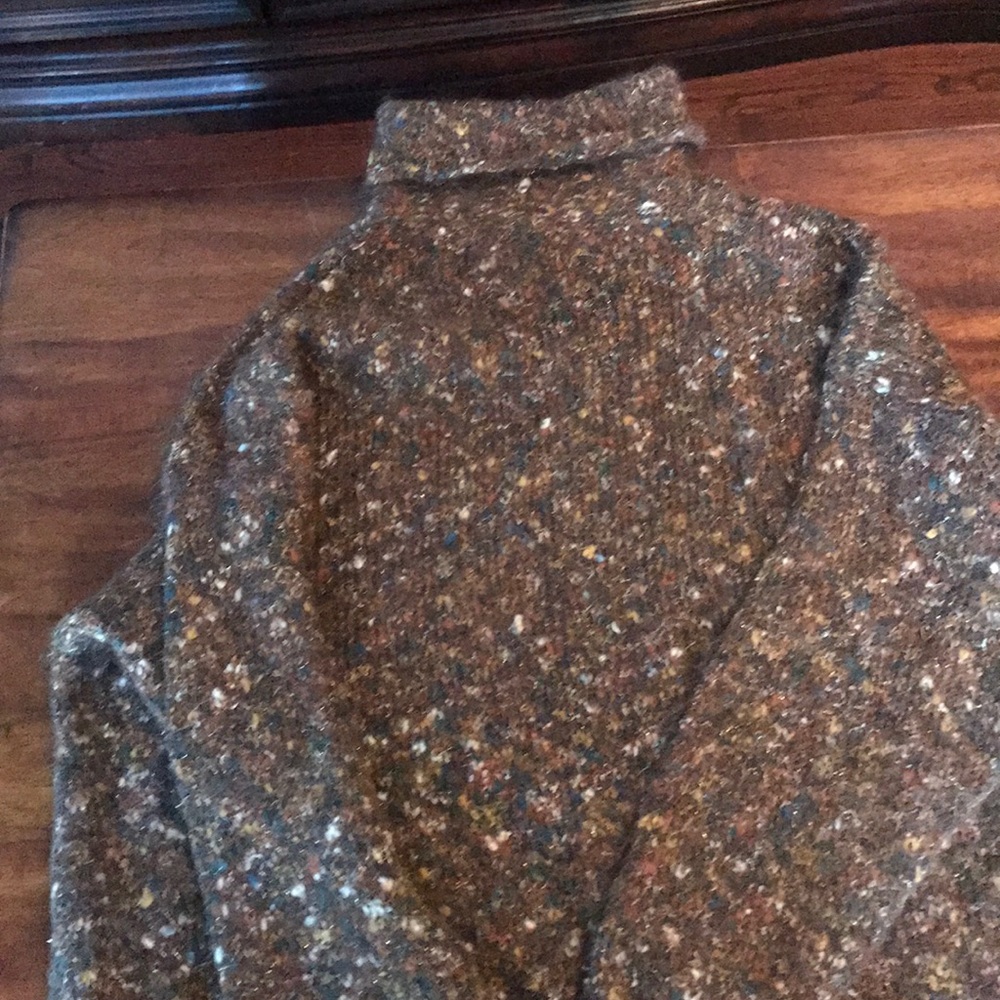 Beautiful sweater and runs big. Winter is coming.